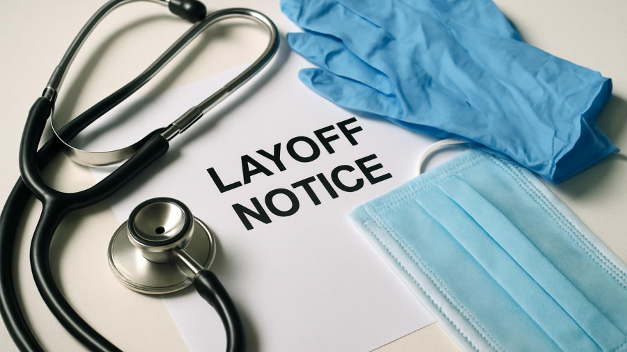Medical items on layoff notice symbolizing Jefferson Health layoffs.
