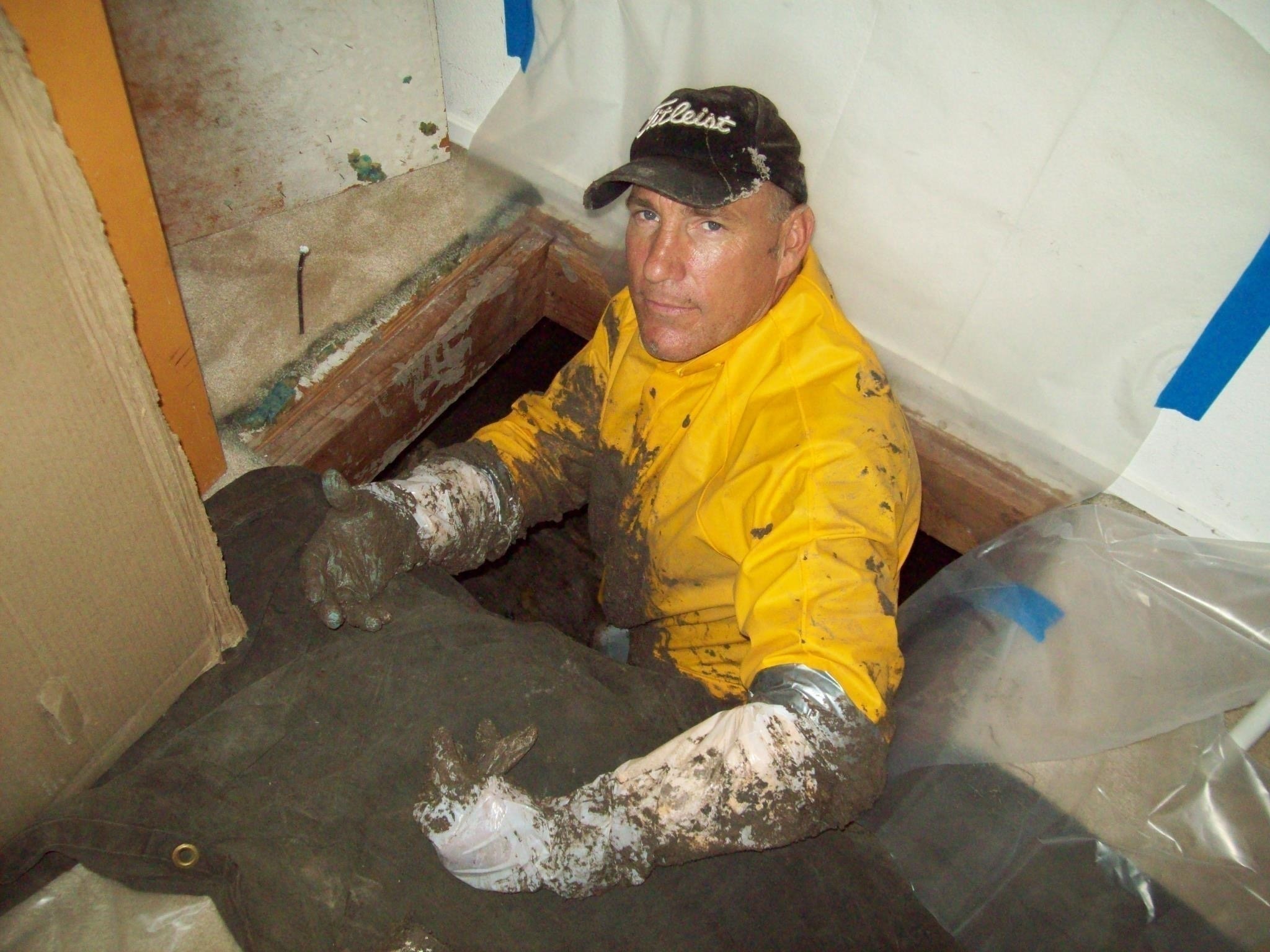 Plumber Mike Lewis working on main water line.