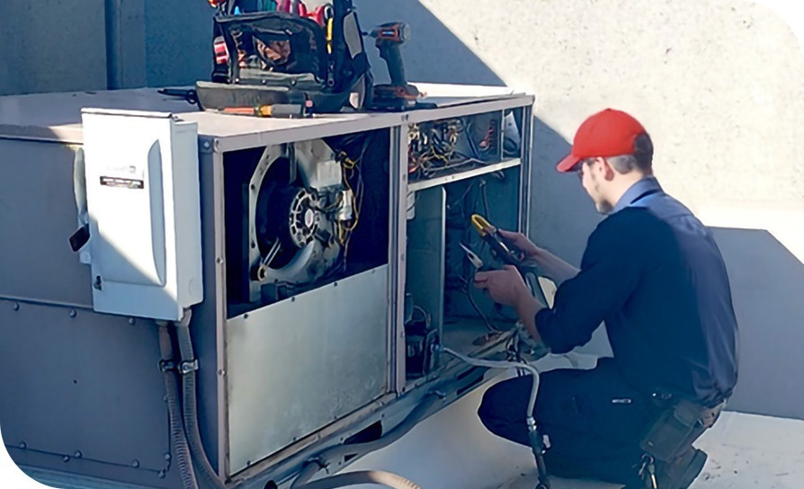 commercial hvac repair by houser's air conditioning & heating service technician in iowa