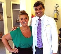 Keith Amodeo in a white lab coat and Abby