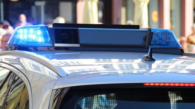 Police car flashing blue lights, MidSouth safety tips