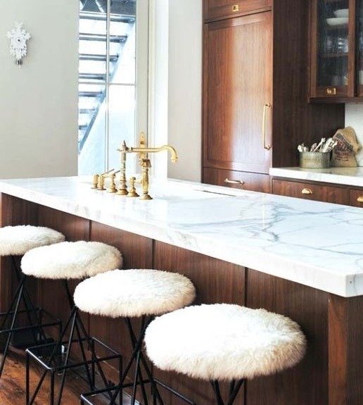 modern kitchen with island and white cabinets and dark wood floor