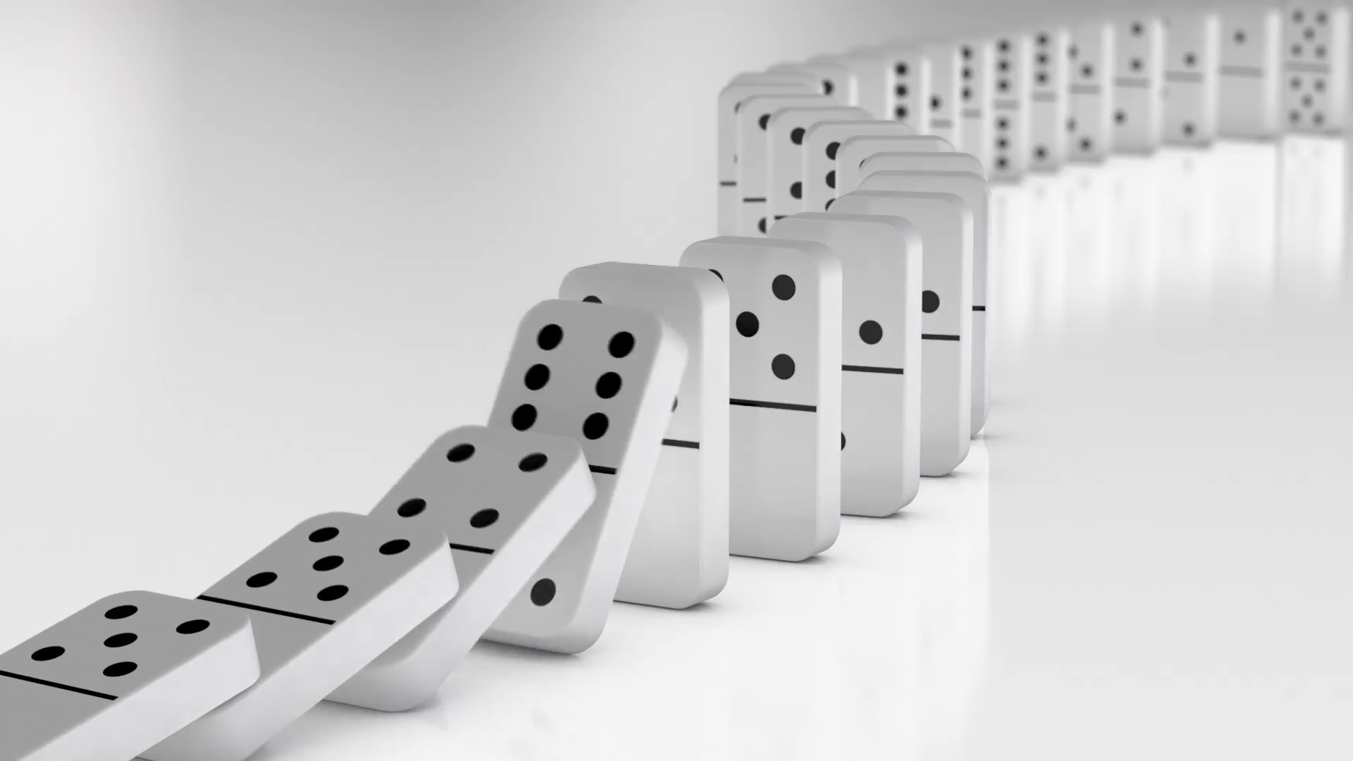 Line of white dominos falling