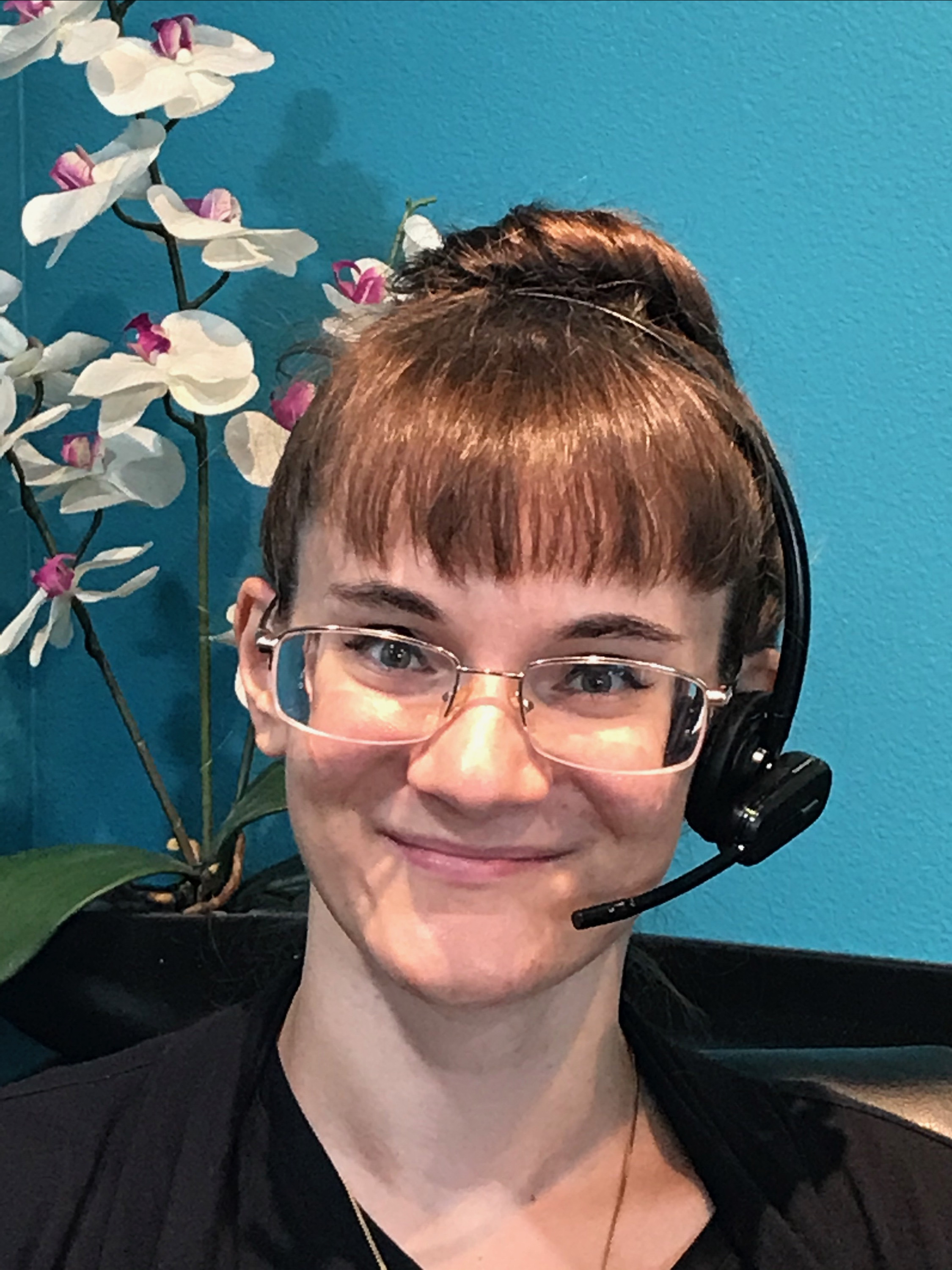 Molly with headset at Allred Eye Fullerton