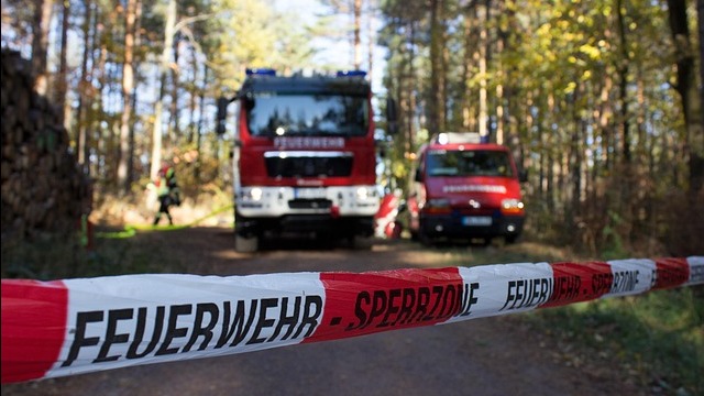 Photorealistic fire truck in daylight, highlighting public trust and firefighter embezzlement issues.