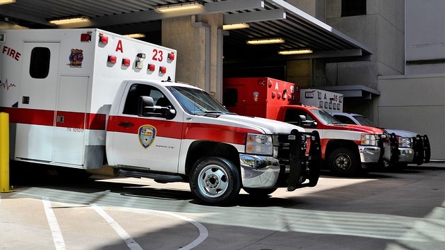 Arkansas ambulance affected by Medicare payment halt, parked in garage.