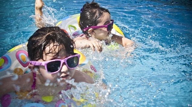 Joyful children enjoying Northwest Arkansas swimming spots