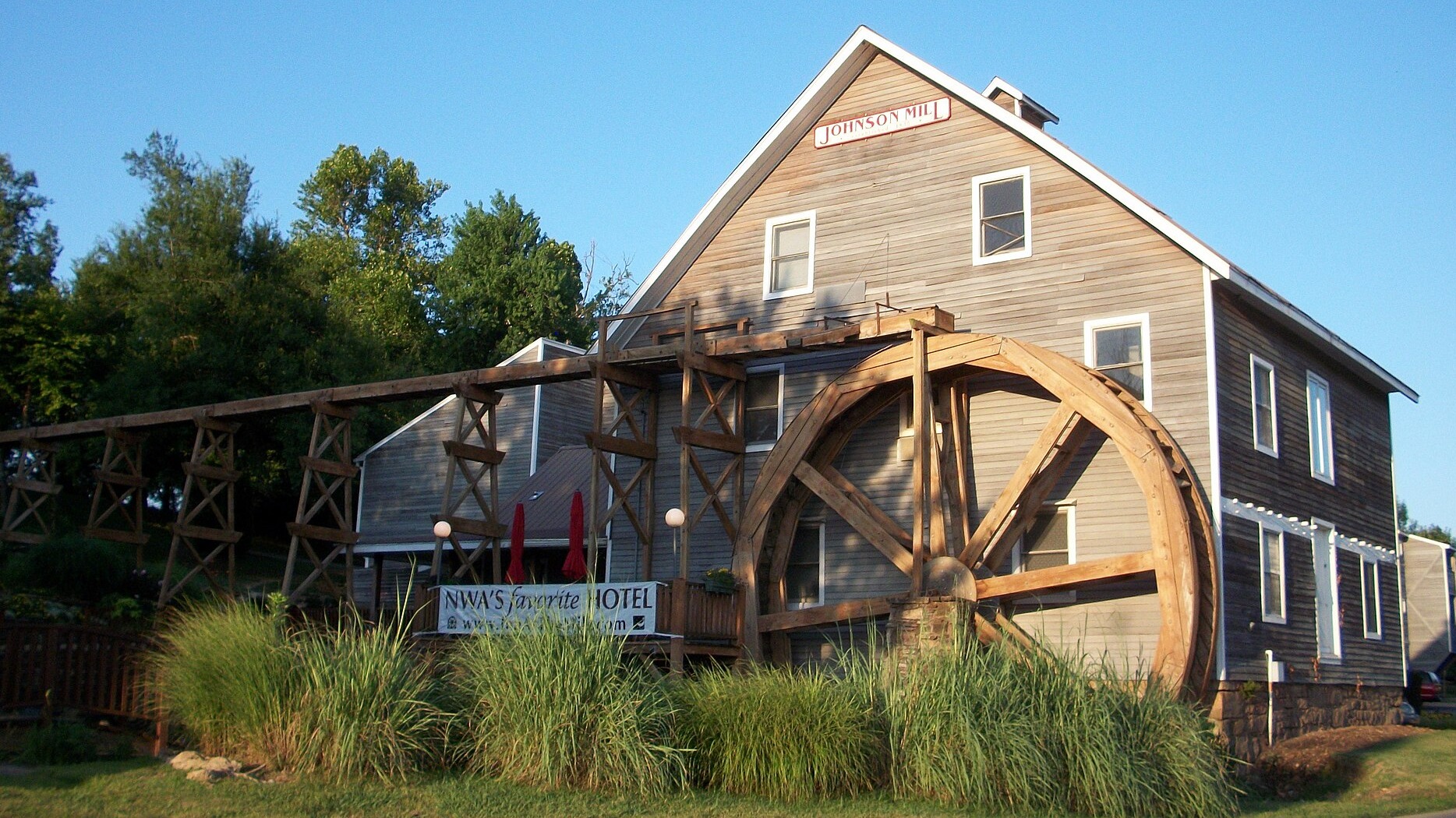 Johnson Arkansas developments with historic building and man