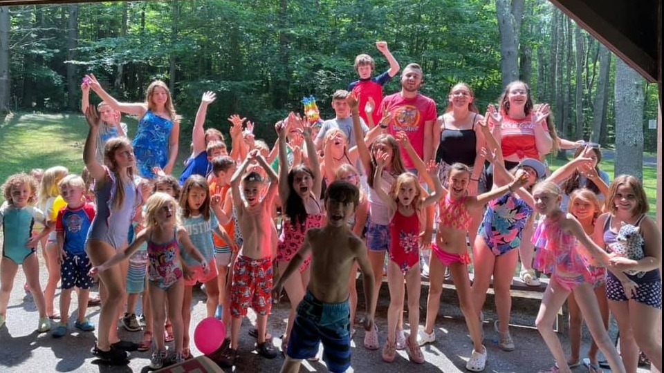 Cambridge Summer Day Campers In Happy Pose