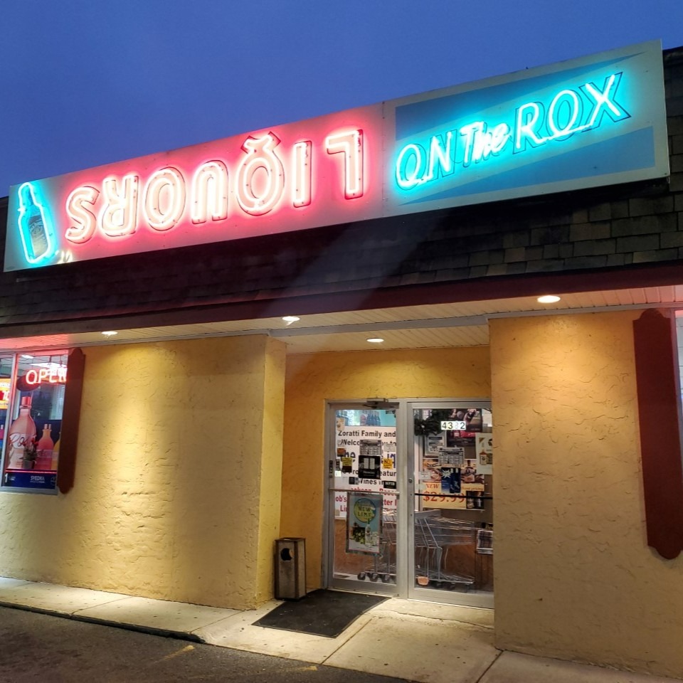 On The Rox Liquors storefront in Amherst NY featuring bottle displays