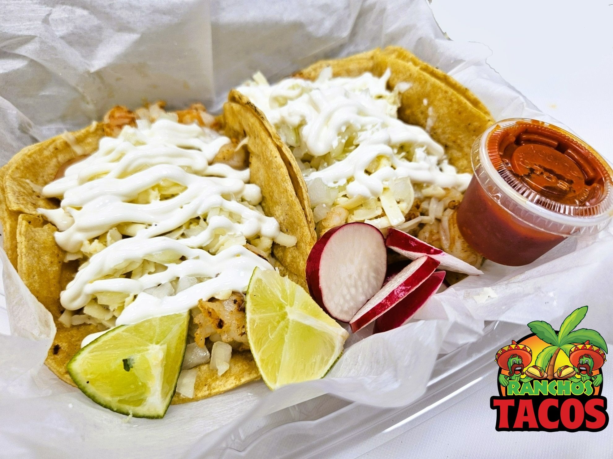 Ranchos Shrimp Tacos with cheese and sour cream in Amherst NY