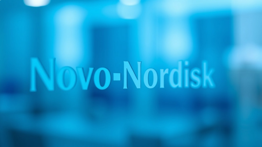 Close-up of Novo Nordisk logo on blue glass, illustrating drug pricing strategies.