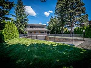 Kamloops waterfront home front yard view