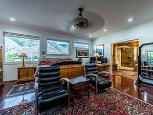 Master bedroom luxury riverfront home Kamloops 2nd image