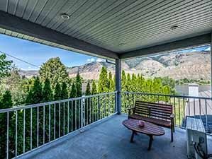 Master bedroom deck with view of waterfront