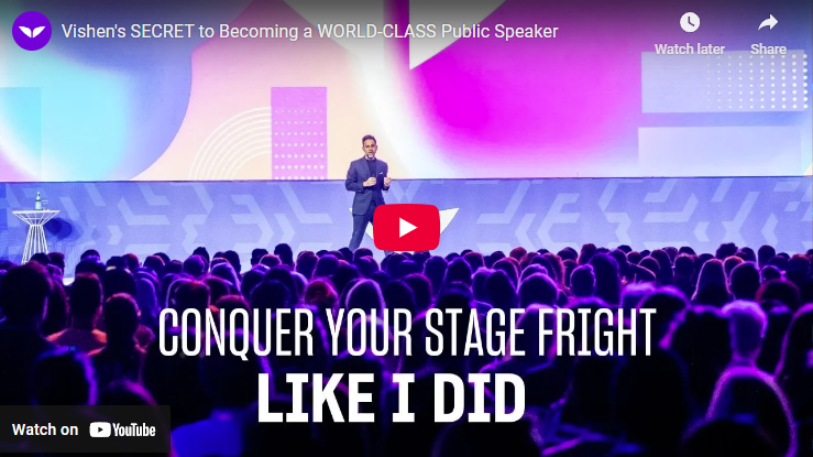 Confident speaker mastering public speaking on vibrant stage.