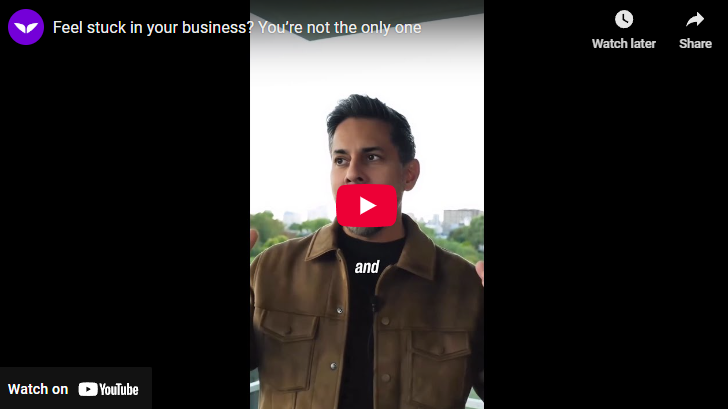 Man speaking passionately on a balcony, feeling stuck in your business theme.