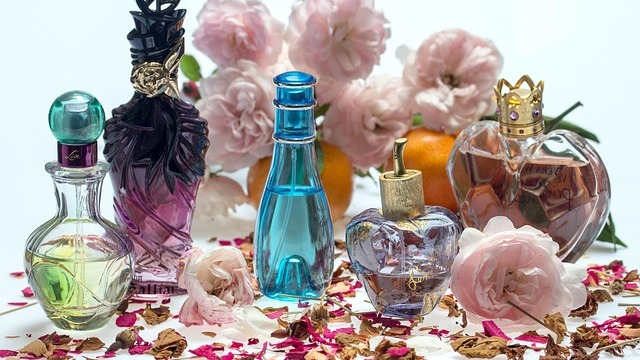 Elegant luxury oud perfumes collection in soft lighting.