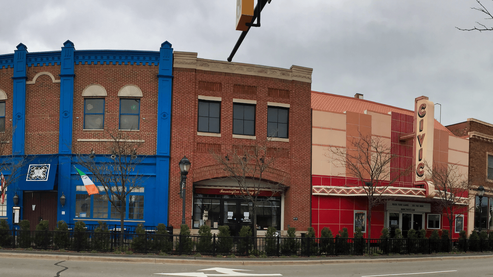 dynamic view of Farmington Hills downtown, vibrant main street with visible green spaces and small business signage, SEO for small business in Farmington Hills