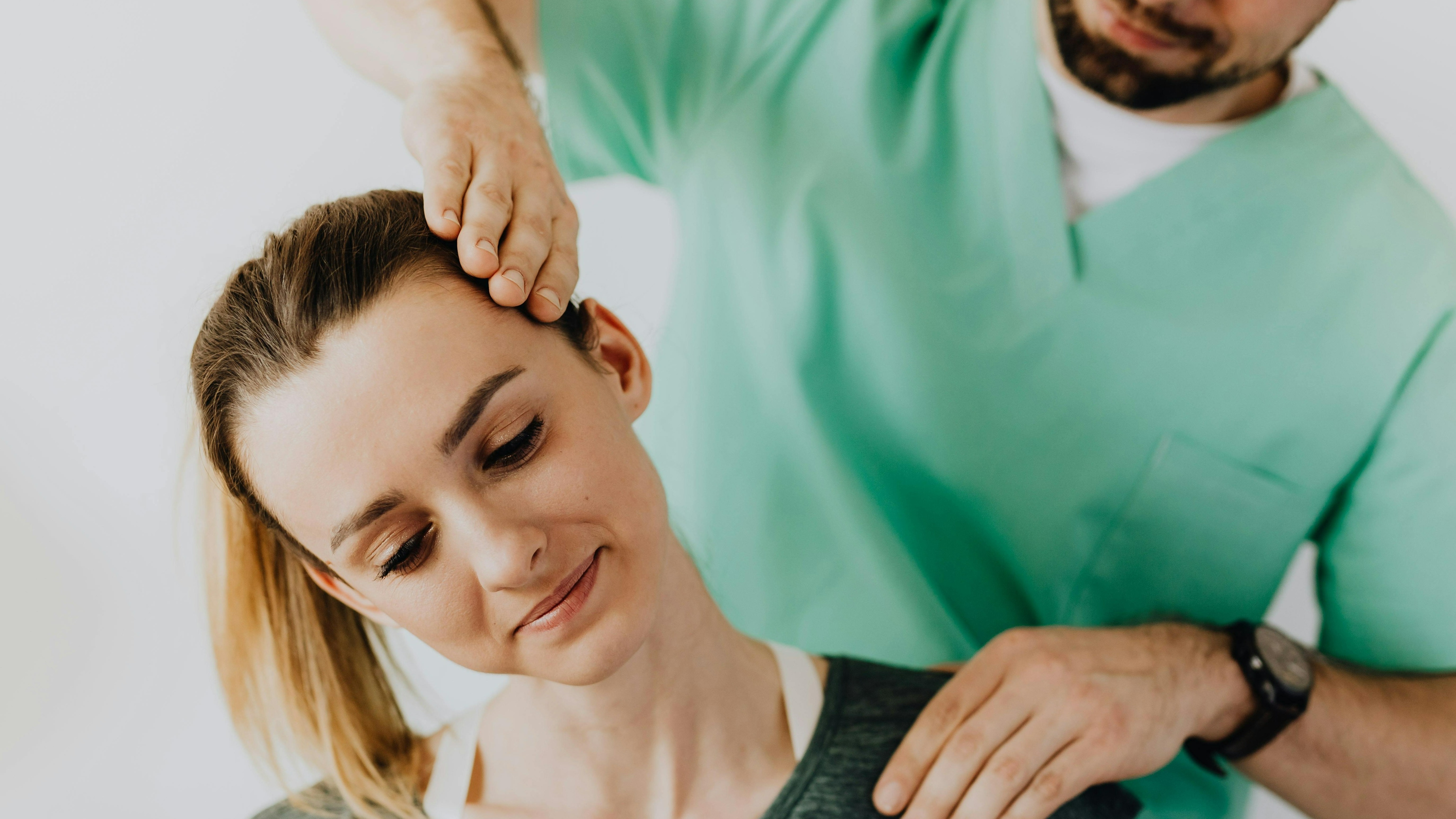 Professional woman in a digital ad for chiropractic care.