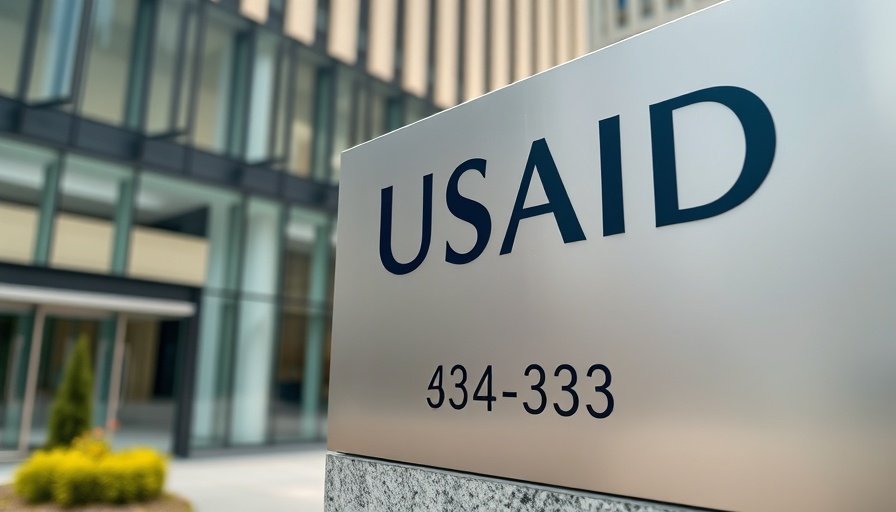 Close-up of USAID office sign in urban setting.