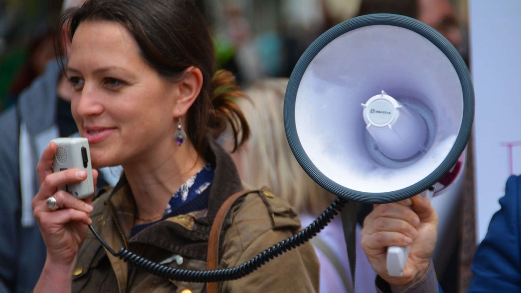 woman speaking on a megaphone