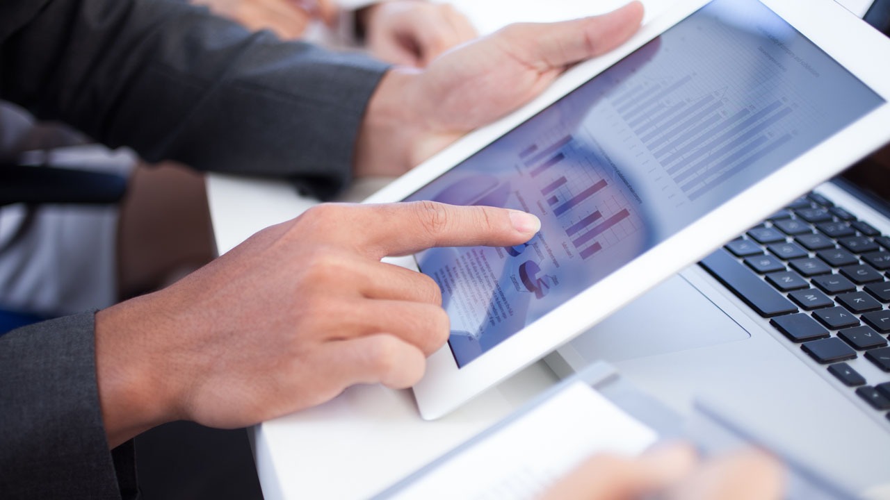 tablet in business womans hands