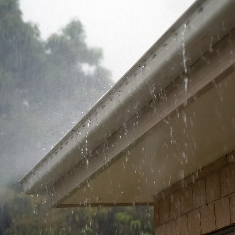 Clogged Gutter Spilling Water