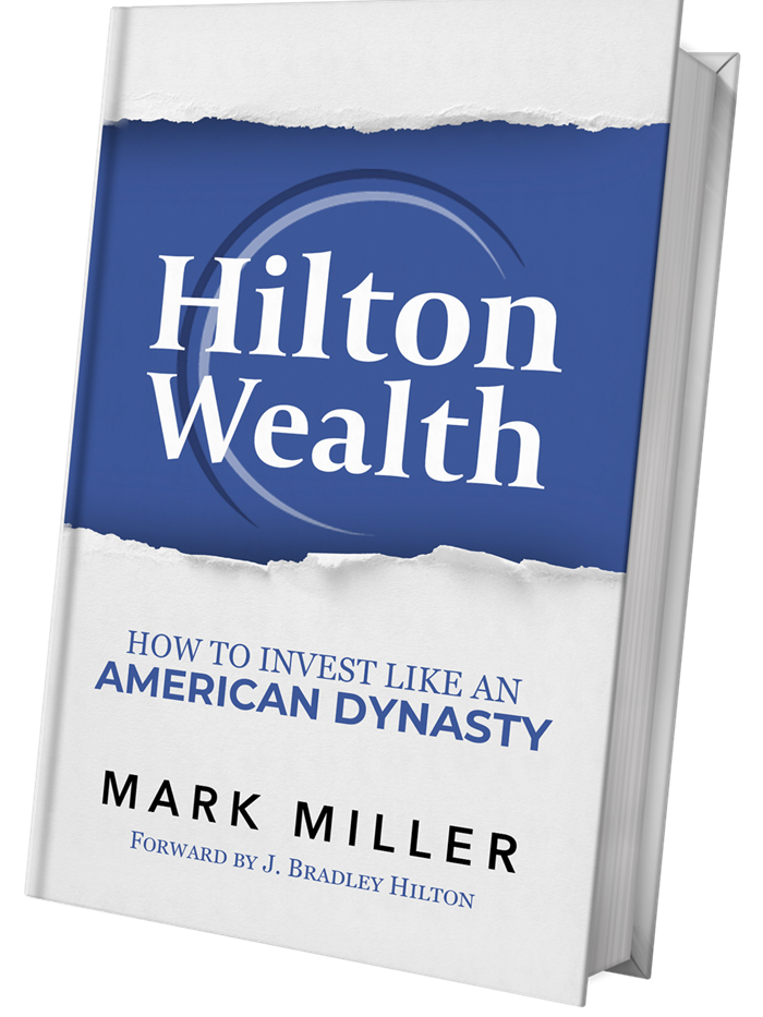 Mark Miller presenting Hilton Wealth book, author sharing generational investing insights in modern office