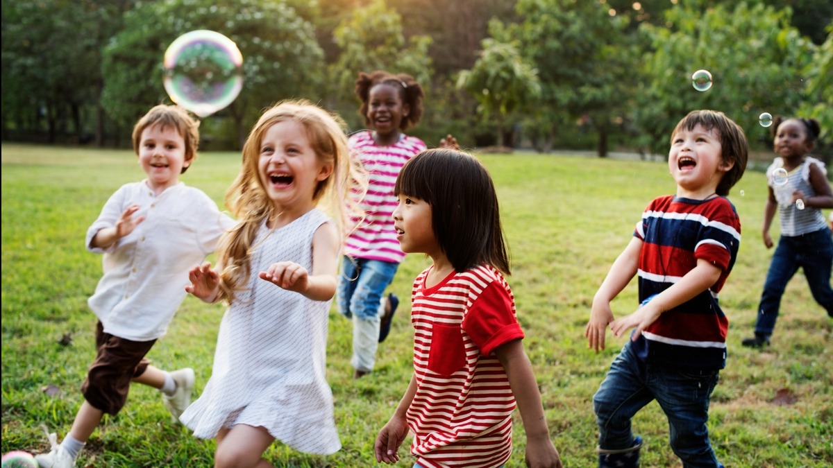 Children playing garden games like the garden games hire available from Monster Inflatables