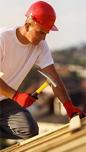 <img src="roffer.jpg" alt="roofer working on a roof">