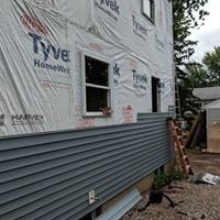<img src="siding.jpg" alt="new siding">