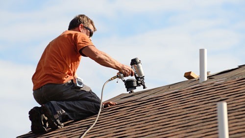 <img src="roof repair.jpg" alt="manrepairing a roof">