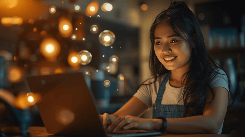 A storytelling scene of a coffee shop owner updating their website on a laptop, with AI search results floating above showing their business top-ranked; warm tones, photorealistic, no visible text or figures; focus on happy expression and clear composition.