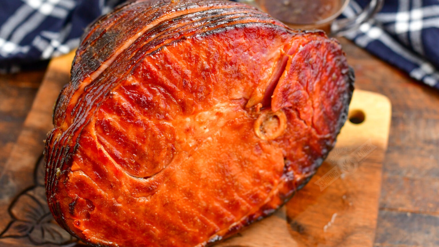Succulent bourbon-glazed ham for the perfect BBQ ham recipe outdoors.
