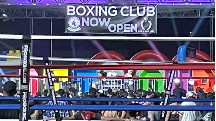 Kids developing confidence through boxing under coach