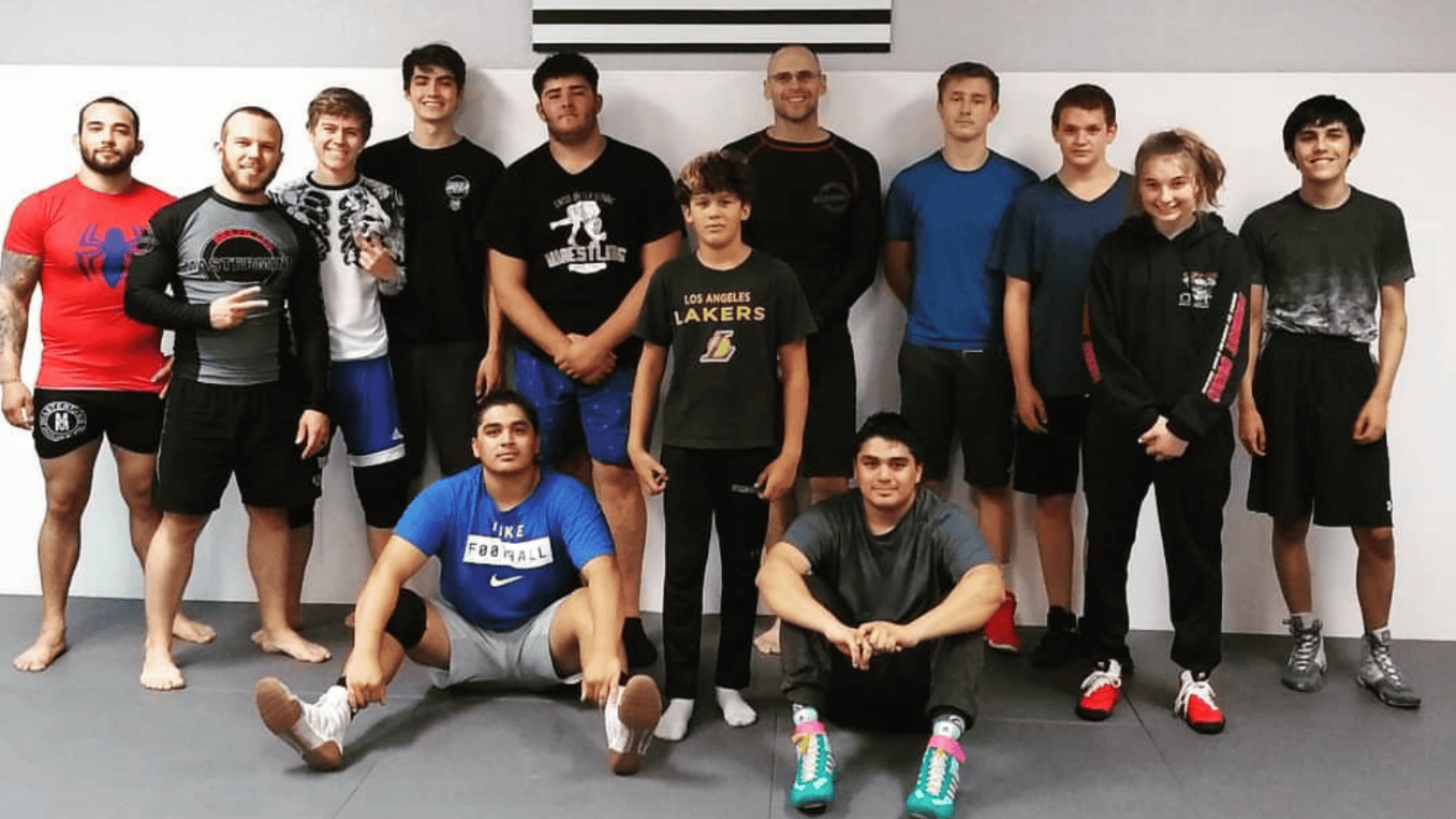 Split scene showing traditional rigid martial arts versus relaxed modern class comparing atmospheres and student expressions