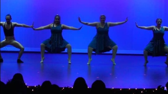 Modern dance instructor recording TikTok dance with students at MCDC