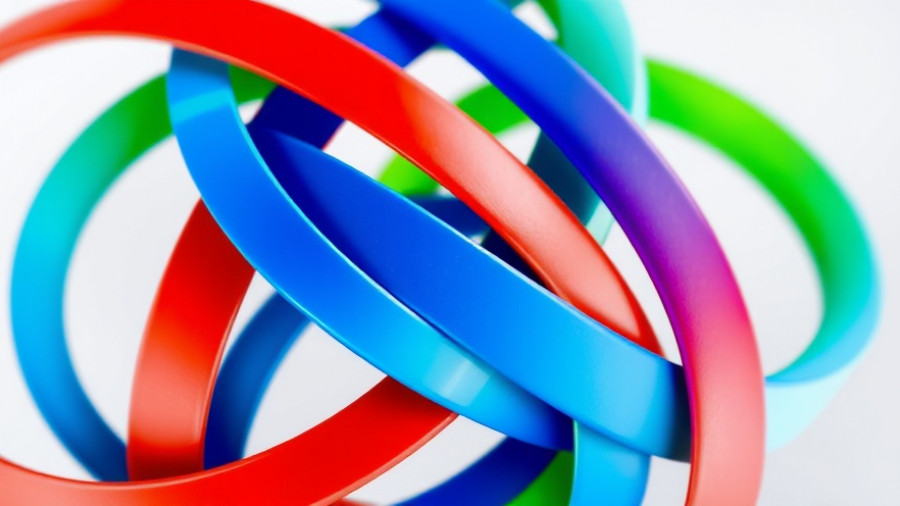 Abstract logo with colorful interwoven lines for Uganda-DRC Business Connect Forum.
