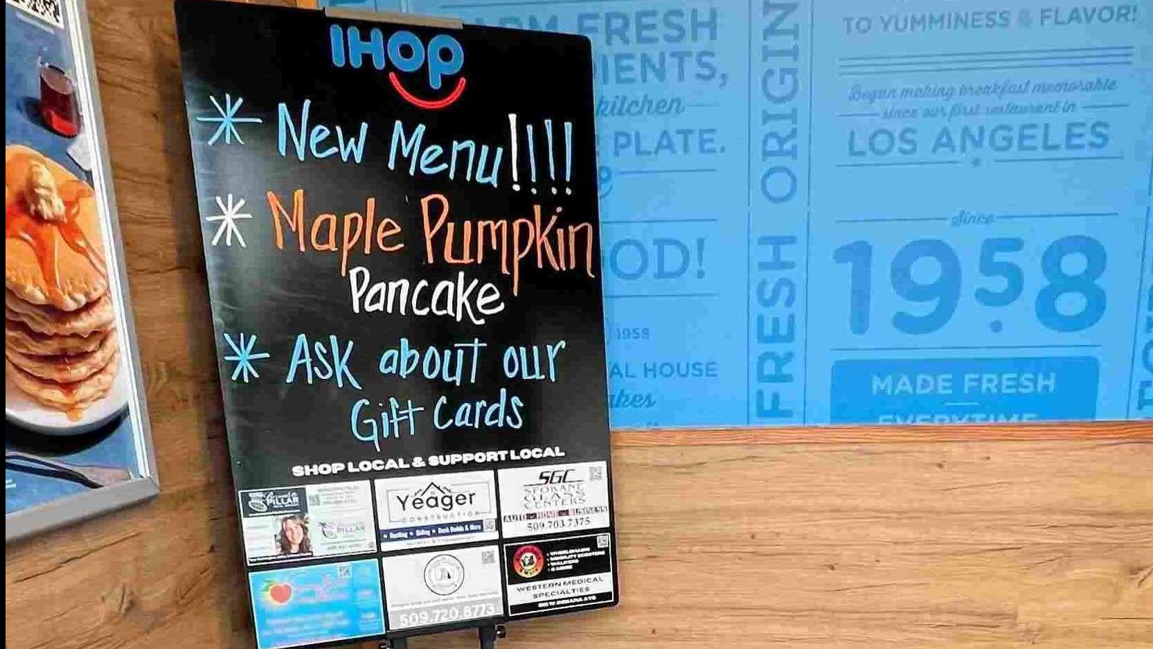 rustic boarddesigns, artistic, showcasing a chalk-drawn menu, photorealistic, in a cozy, dimly lit bistro, highly detailed, patrons enjoying meals, high resolution, muted earth tones, ambient candlelight, shot with an 85mm lens.