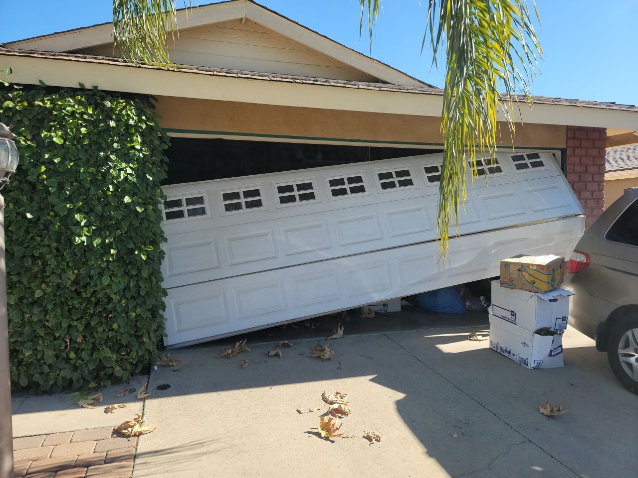 garage door halfway fallen broken springs urgent garage door repair near me situation