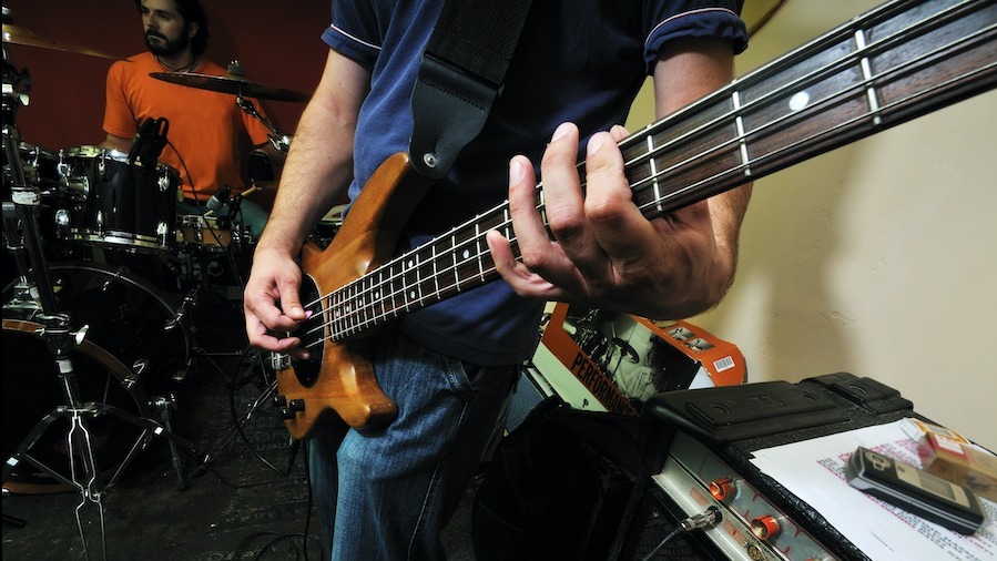 medium shot of an electric guitar at a local music event