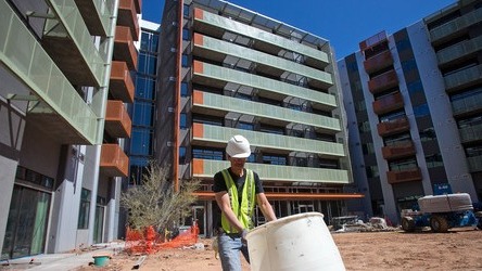 Workman doing a final cleaning on a worksite
