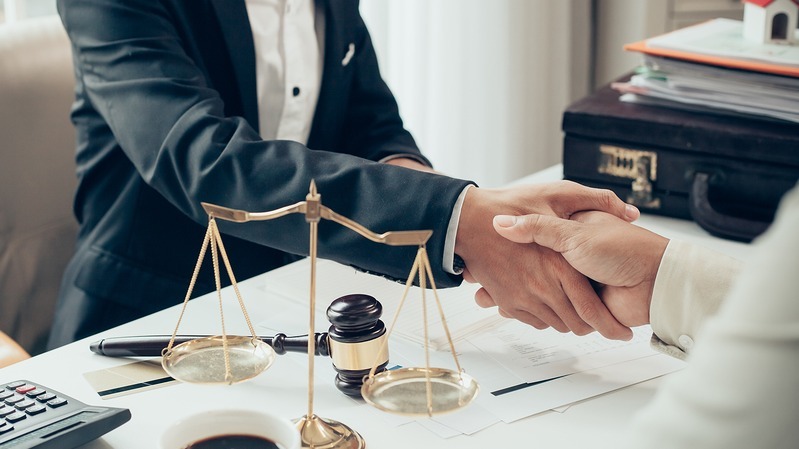 Lawyer shaking hands