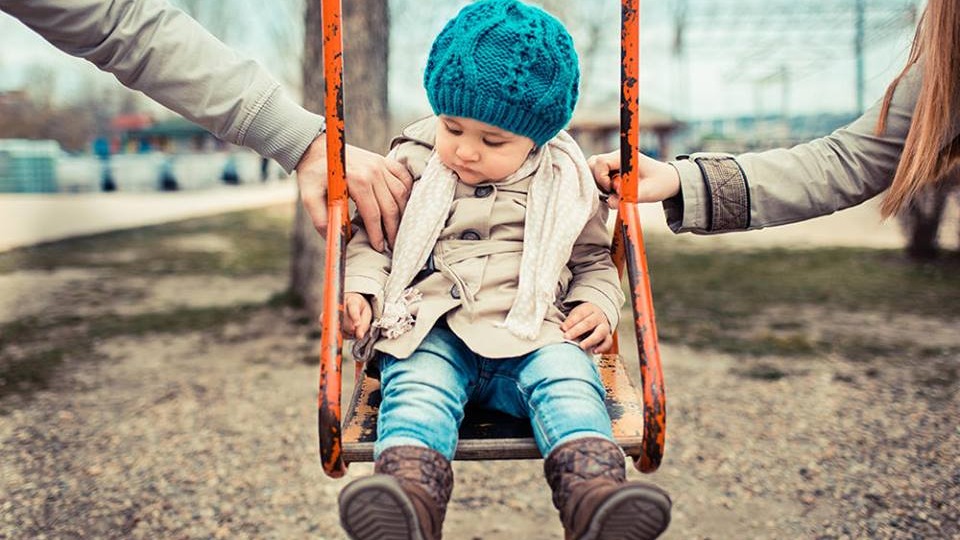 Young child on swing