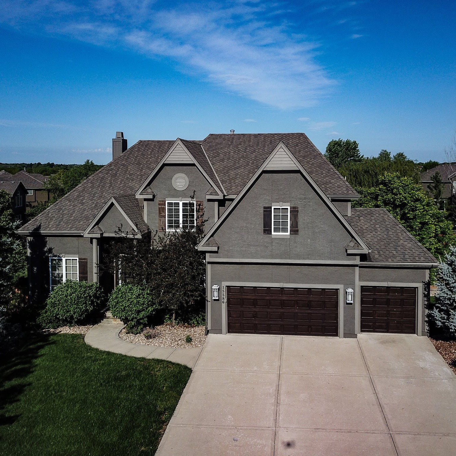 Skyshot of large scale grey home