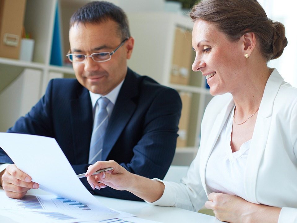 Lawyer and client reviewing documents