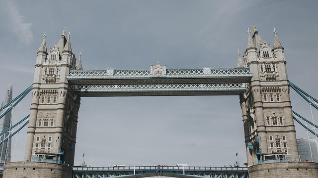 Woman using smartphone connected to EE's 5G standalone network outdoors