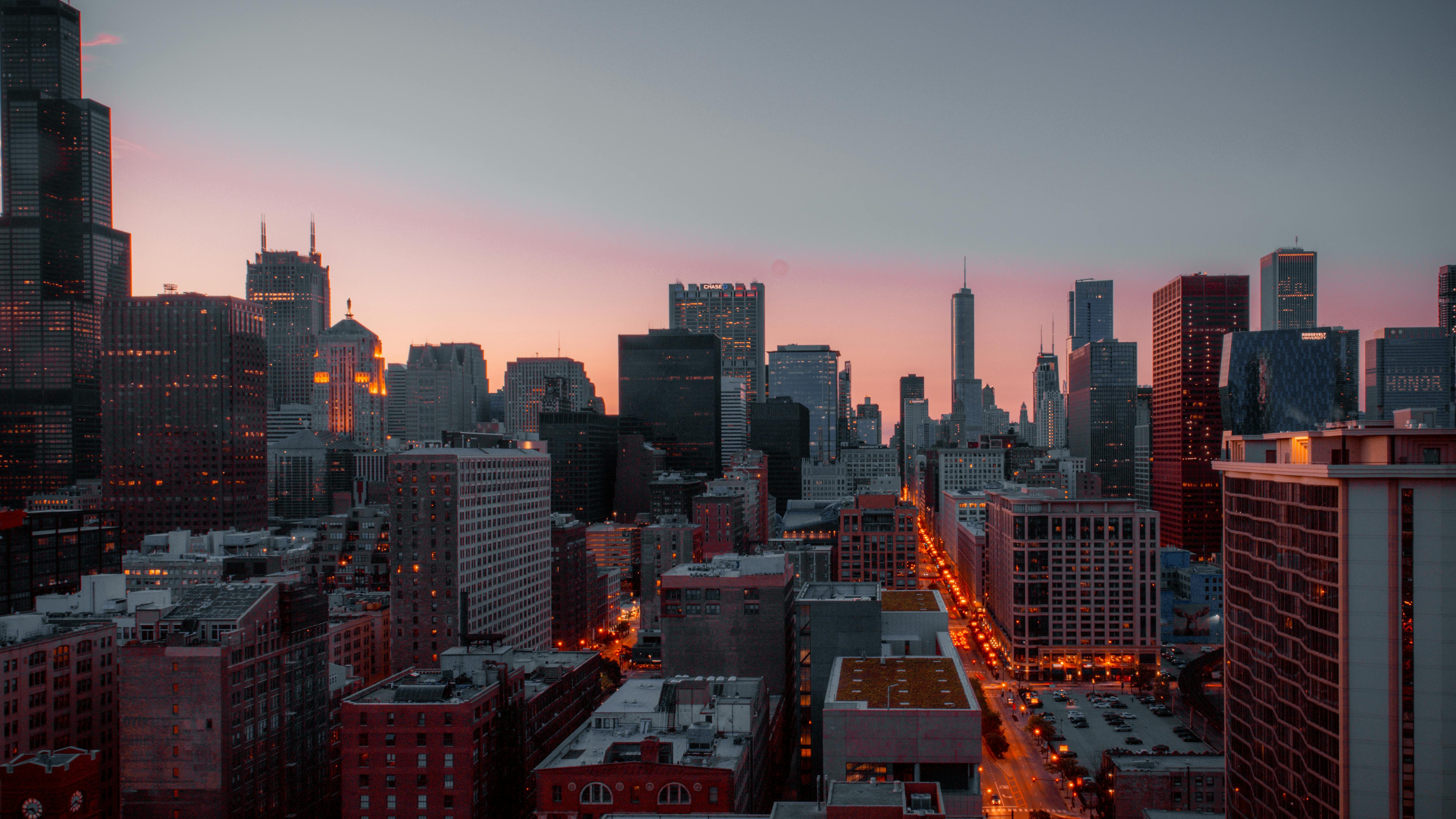 Vibrant urban neighborhood in Chicago with classic red brick buildings.