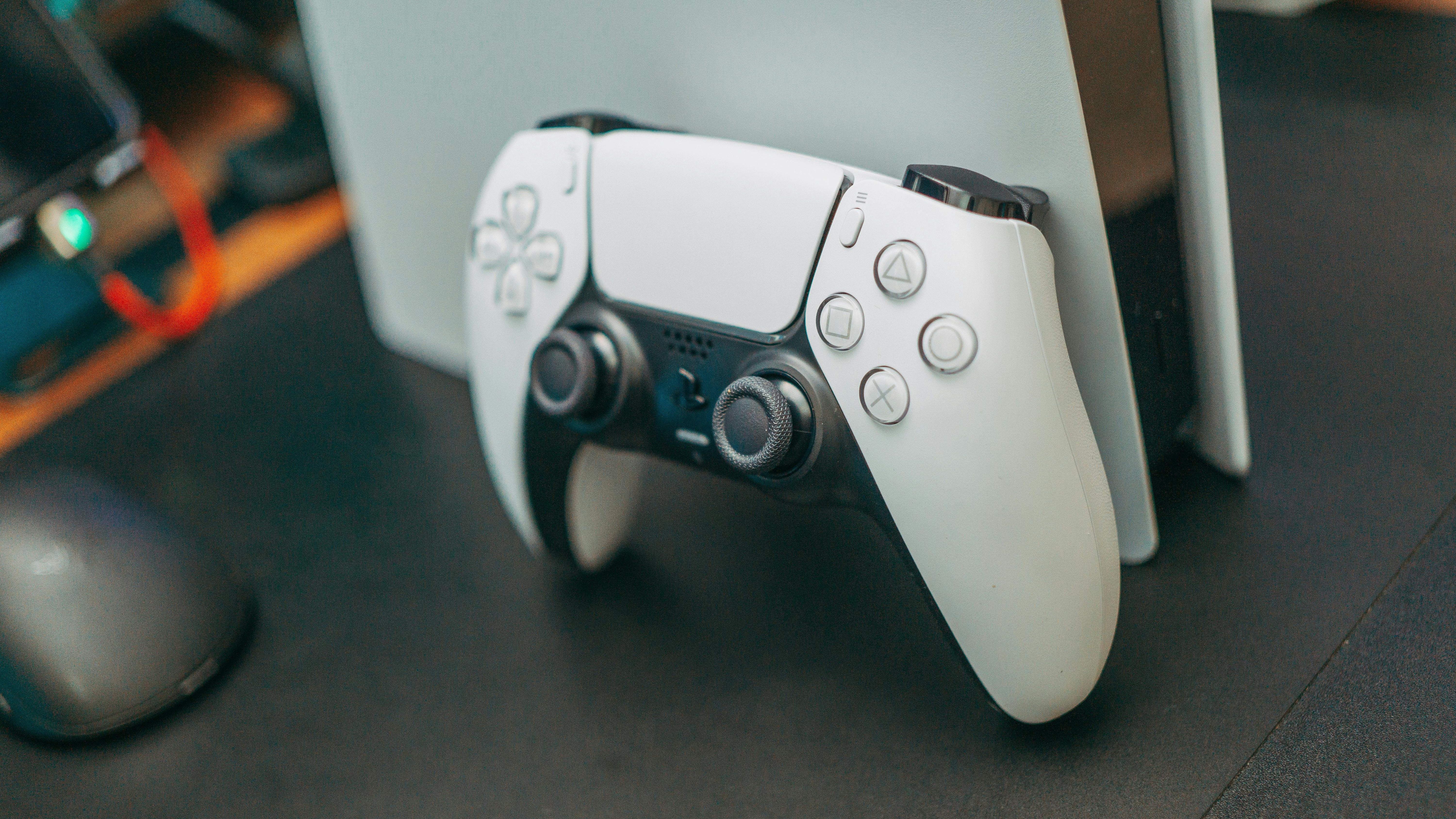 PlayStation 5 Pro pricing and features against blue backdrop